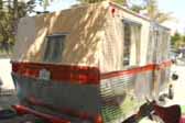 Photo of rear end of 1962 Holiday House 18ft. trailer