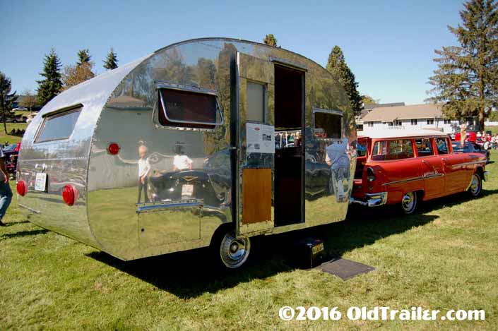 This vintage towing rig is a 1955 chevy station wagon pulling a 1948 boles aero vintage trailer