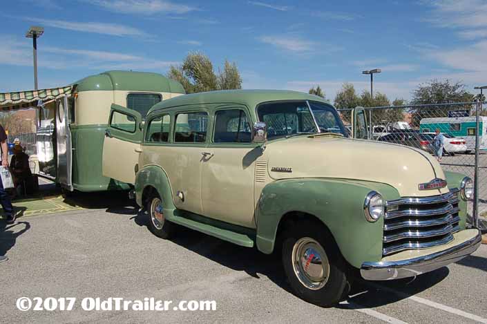 This vintage towing rig is a 1952 Chevy Suburban pulling a 1948 Palace Royal Vintage Trailer
