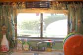 Side window over kitchen sink in a restored 1951 Vagabond trailer