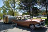Photo of a 1958 studebaker provincal station wagon towing a teardrop trailer