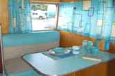 Fun kitchen retro design theme in 1959 Shasta Airflyte vintage trailer