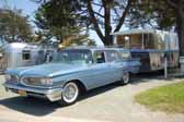 Picture of a 1959 pontiac catalina station wagon towing a 1960 holiday house trailer