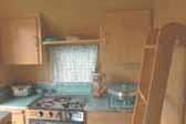 Blond ash cabinetry and paneling in 1963 Shasta Backentry Trailer