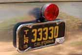 Rare vintage california trailer license plate on a restored 1953 Aljoa vintage Travel Trailer