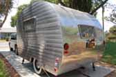 Street side view of beautifully restored 1953 Sportcraft Trailer distributed by Aljoa Industries