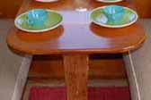 Rare all wood vintage dining table in a 1954 Shasta 1400 Travel Trailer
