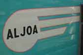 1955 Aljoa vintage trailer with turquoise painted Aljoa logo on the side