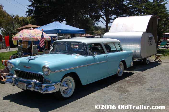 This vintage towing rig is a vintage 1955 chevy nomad station wagon pulling a vintage teardrop trailer