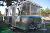Photo of vintage 1960 Holiday House travel trailer at Trail Along to Pismo rally