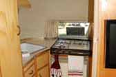 Photo of 1961 Airstream Bambi trailer showing kitchen area