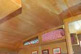 Original ceiling cabinets in dining area of 1962 Shasta Compact Trailer