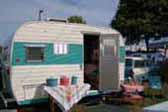 Nicely restored 1965 Aloha travel trailer and 1958 Edsel 2 door wagon in matching turquoise and white paint colors