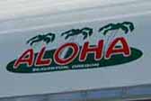 Photo shows new reproduction Aloha trailer logo decal on front of restored 1966 Aloha travel trailer
