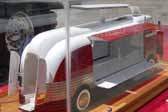 This scale model of one of GM's Parade of Progress buses shows how the sides opened up so the public could see the exciting exhibits displayed inside