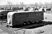 Old photo shows a group of Vintage Trailers that housed workers and their families, at the Hanford Trailer Camp