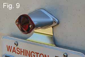 In this final image the vintage trailer license plate light has been restored and re-installed on the trailer with a new license plate bracket