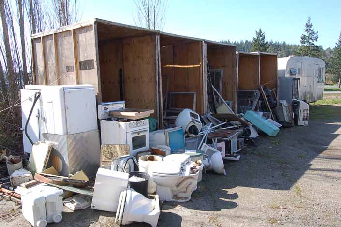 Vintage trailer junk yard has a selection of salvaged trailer appliances and bath room fixtures available for trailer restoration projects