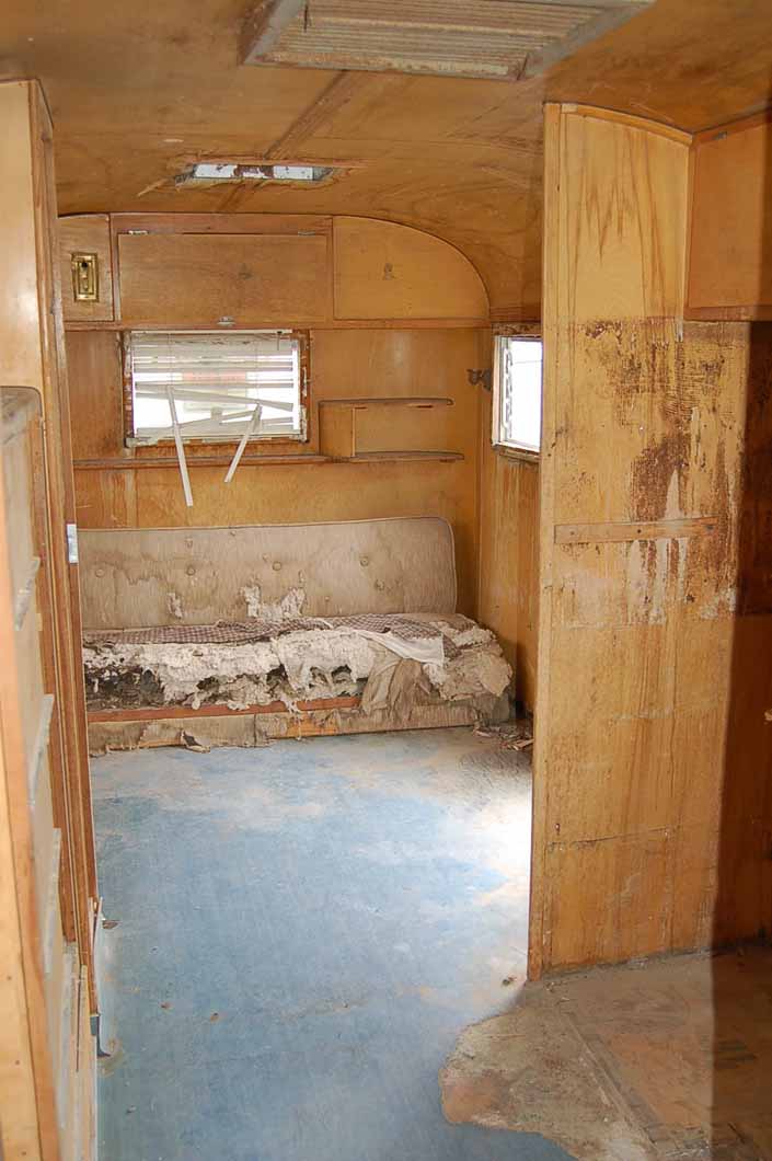 Shabby but restorable interior in a 1947 Westcraft vintage trailer for sale at Pismo Trailer Rally