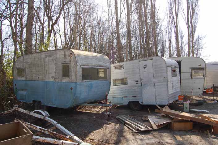 Project trailers for restoration, stored in a Vintage Trailer Junkyard