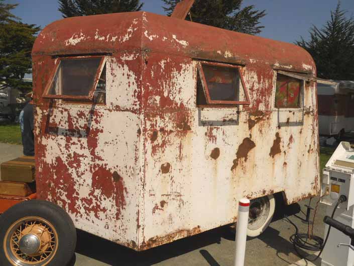1936 Covered Wagon trailer in a vintage trailer StorageYard is a great restoration project