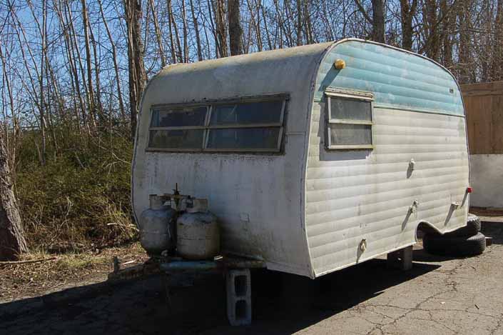 Serro-Scotty trailer in a vintage trailer Storage-Yard, awaiting a complete restoration
